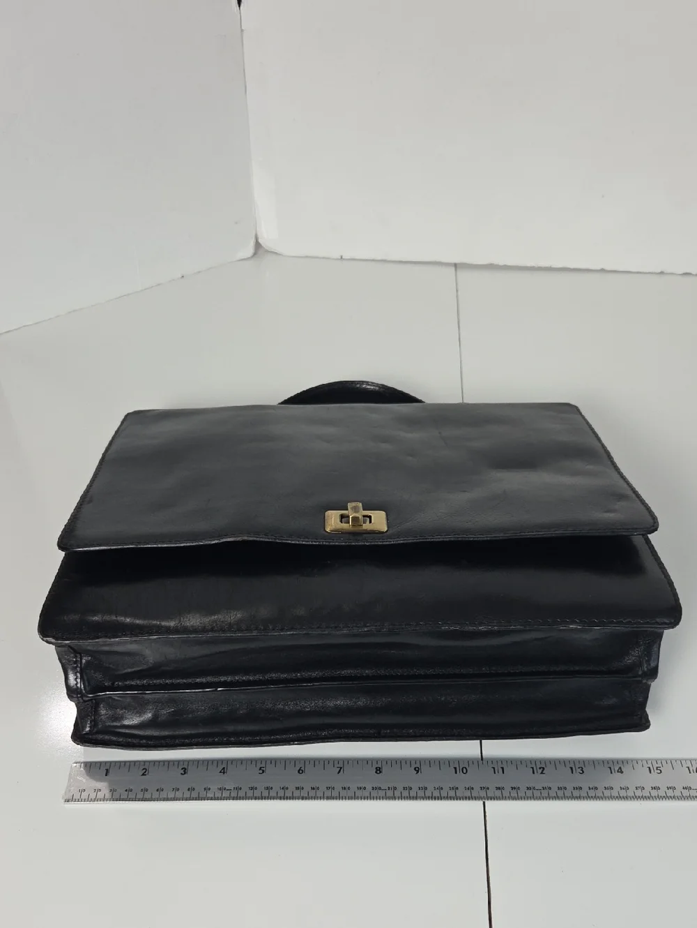Tumi Full Grain Leather Briefcase Bag in Black With Gold Accent Turnlock